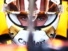 Max Verstappen of the Netherlands and Oracle Red Bull Racing prepares to drive in the garage before the F1 Grand Prix of Australia at Melbourne Grand Prix Circuit on April 10, 2022 in Melbourne, Australia.