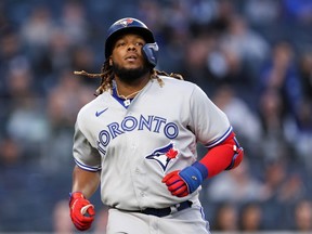 NEW YORK, NEW YORK - APRIL 12: Vladimir Guerrero Jr. #27 of the Toronto Blue Jays reacts after striking out during the first inning of the game against the New York Yankees  at Yankee Stadium on April 12, 2022 in New York City.
