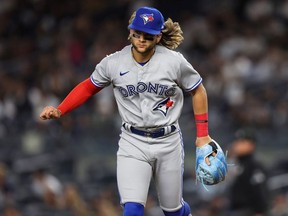 Bo Bichette of the Toronto Blue Jays runs off the field at the end of the fifth inning of the game against the New York Yankees at Yankee Stadium on April 12, 2022 in New York City.