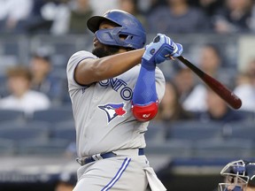 Vladimir Guerrero Jr.  of the Blue Jays follows through on his first inning home run against the New York Yankees at Yankee Stadium on April 13, 2022 in New York City.