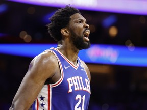 Joel Embiid #21 of the Philadelphia 76ers reacts after scoring during the second quarter against the Toronto Raptors during Game 1 of the Eastern Conference playoff match in Philadelphia on Saturday.