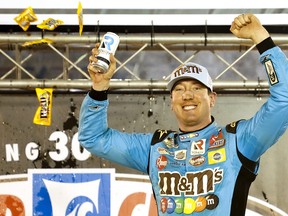 Kyle Busch, driver of the #18 Mars Crunchy Cookie Toyota, celebrates in victory lane after winning the NASCAR Cup Series Food City Dirt Race at Bristol Motor Speedway on April 17, 2022 in Bristol, Tennessee.