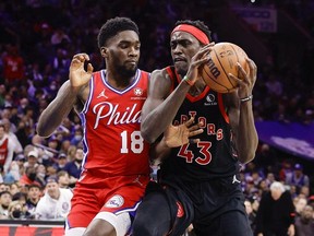 Shake Milton of the Philadelphia 76ers guards Pascal Siakam of the Toronto Raptors during the third quarter during Game Two of the Eastern Conference First Round at Wells Fargo Center on April 18, 2022 in Philadelphia, Pennsylvania.