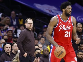 Head coach Nick Nurse of the Toronto Raptors looks on at Joel Embiid during the fourth quarter against the Philadelphia 76ers in Game Two of the Eastern Conference First Round at Wells Fargo Center on April 18, 2022 in Philadelphia.
