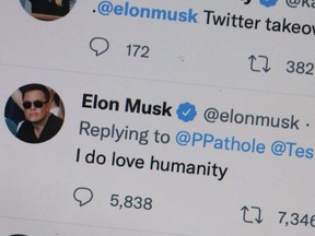Tweets by Elon Musk are shown on a computer April 25, 2022 in Chicago, Illinois. It was announced today that Twitter has accepted a $44 billion bid from Musk to acquire the company.