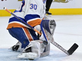 New York Islanders goalie Ilya Sorokin  makes a pad save during the second period of the game against the Montreal Canadiens.