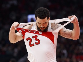 Raptors' Fred VanVleet rips his jersey.