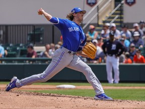 Blue Jays pitcher Kevin Gausman throws a pitch to the Tiger in Lakeland, Fla. yesterday. The Tigers won 4-2.