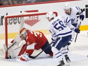 Panthers goaltender Spencer Knight (30) blocks the shot of Toronto Maple Leafs left wing Michael Bunting.