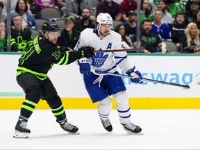 Dallas Stars centre Luke Glendening defends against Toronto Maple Leafs centre Auston Matthews during the first period at the American Airlines Center in Dallas, Texas, April 7, 2022.
