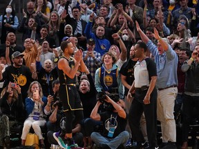 Golden State Warriors guard Stephen Curry (30) reacts after making a layup against the Denver Nuggets with under 30 seconds remaining in the fourth quarter during game five of the first round for the 2022 NBA playoffs at Chase Center on April 27, 2022.