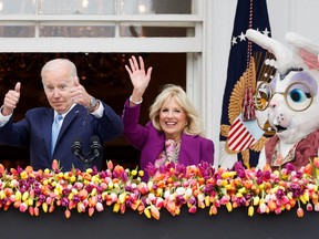 U.S. President Joe Biden and first lady Jill Biden gesture during the annual Easter Egg Roll at the White House in Washington, D.C., April 18, 2022.