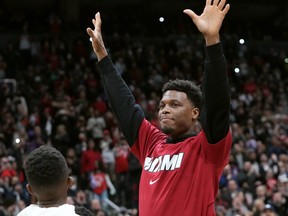 Miami Heat guard Kyle Lowry (7) acknowledges the crowd prior to first half NBA basketball action against the Toronto Raptors, in Toronto, Sunday, April 3, 2022.