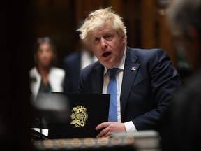 British Prime Minister Boris Johnson speaks at the House of Commons, in London, April 19, 2022.