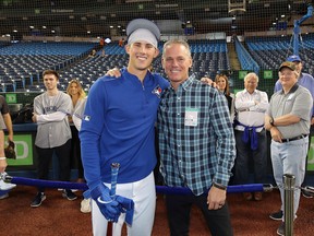 Cavan Biggio (left) of the Toronto Blue Jays poses with his father and Hall of Fame member Craig Biggio back in 2019.