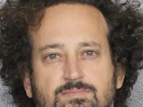 Good-time Charlie: Cops say Dr. Charles Adelson arranged his sisters husbands murder. LEON COUNTY PROSECUTOR