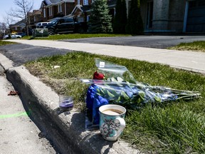 Relatives of a fatal shooting victim leave a full coffee at the scene along with roses. Peel Police are investigating after a 22-year-old was gunned down in Brampton.