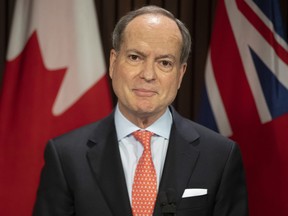 Ontario Finance Minister Peter Bethlenfalvy takes to the podium during a news conference in Toronto on April 28, 2021.