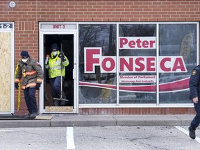 Police and Ontario fire investigators check out a suspicious fire that broke out at the Mississauga constituency office of Liberal MP Peter Fonseca, representing the riding of Mississauga East—Cooksville in Mississauga on Wednesday, February 23, 2022.