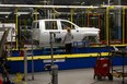 An auto worker is seen at the GM Assembly plant producing the Chevrolet Silverado, in Oshawa on February 22 2022.