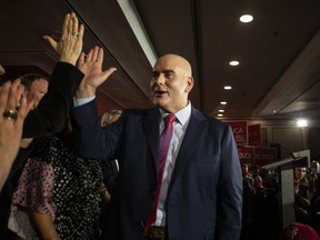 Ontario Liberal Party Leader Steven Del Duca high fives candidates after speaking in Toronto, Saturday, March 26, 2022, as the party announces its first platform plank ahead of the provincial election.