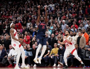 Toronto Raptors guard Fred VanVleet (23) and forward Precious Achiuwa (5) watch Philadelphia 76ers centre Joel Embiid’s (21) game winning three pointer fly during overtime NBA first round playoff action in Toronto on Wednesday April 20, 2022. THE CANADIAN PRESS/Nathan Denette