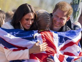 Thomas Markle Calls Prince Harry An 'Idiot' But Hopes To Meet Him Soon Prince Harry And Meghan Markle, Duke And Duchess Of Sussex, Hug Lisa Johnston, A Former Army Amputee Medic, Who Celebrates Her Medal At The Invictus Games Site In The Hague, Netherlands On Sunday, April 17, 2022.