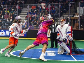 A Toronto Rock player takes a shot into the net against the Halifax Thunderbirds in Hamilton on April 16, 2022.