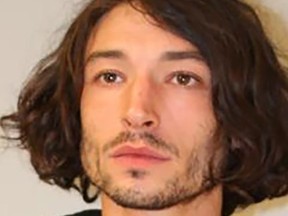 In this handout image provided by Hawaii Police Department, Ezra Miller is seen in a police booking photo after their arrest for second-degree assault on April 19, 2022 in Pahoa, Hawaii.
