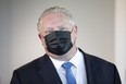 Premier Doug Ford asked residents to mask up on Sunday but stopped short of mandating the practice.