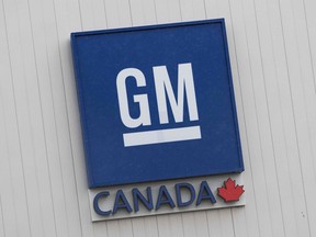 In this file photo taken on November 26, 2018, the General Motors plant sign is seen in Oshawa, Ontario, on November 26, 2018.