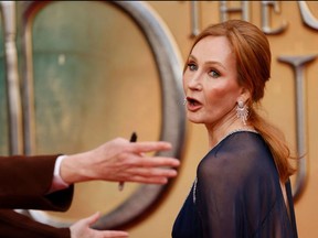 British writer J.K Rowling reacts on the red carpet after arriving to attend the World Premiere of the film "Fantastic Beasts: The Secrets of Dumbledore" in London on March 29, 2022.