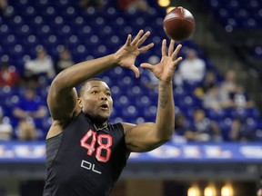 Travon Walker #DL48 of Georgia runs a drill during the NFL Combine at Lucas Oil Stadium on March 05, 2022 in Indianapolis, Indiana.