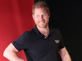 Prince Harry, Duke of Sussex plays on a golf simulator during day four of the Invictus Games The Hague 2020 at Zuiderpark on April 19, 2022 in The Hague, Netherlands. (Photo by Chris Jackson/Getty Images for the Invictus Games Foundation)