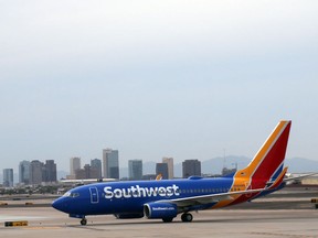 A Southwest airline plane is seen on the tarmac at Phoenix Sky Harbor International Airport on September 19, 2016 in Phoenix, Arizona. (Photo credit should read DANIEL SLIM/AFP via Getty Images)