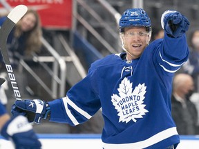 Toronto Maple Leafs right wing Ondrej Kase (25) points to a teammate after scoring a goal during the third period against the Dallas Stars at Scotiabank Arena on March 15, 2022.