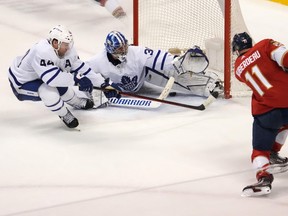 Panthers' Jonathan Huberdeau scores the game-winning goal past Maple Leafs goaltender Jack Campbell in overtime at FLA Live Arena on Tuesday, April 5, 2022.