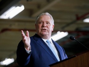 Ontario Premier Doug Ford speaks as he visits the production facilities of Honda Canada Manufacturing in Alliston, Ont., on March 16, 2022.