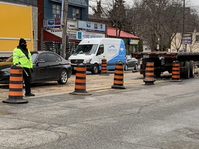 Toronto Police at the scene April 1, 2022 on Lakeshore Blvd. W. the day after a crash killed two pedestrians and a driver.