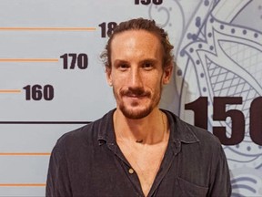 This handout photo taken on April 25, 2022 and released on April 26 by the Bali Immigration Office shows Canadian tourist Jeffrey Craigen detained by immigration authorities in Denpasar, on Indonesia's resort island of Bali.