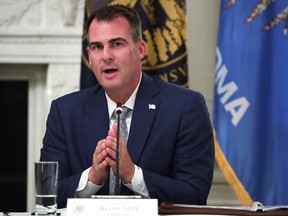 Governor Kevin Stitt speaks during a roundtable at the State Dining Room of the White House June 18, 2020 in Washington, DC.