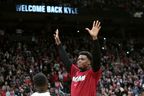 Miami Heat guard Kyle Lowry acknowledges the crowd prior to facing his former team, the Raptors, in Toronto on Sunday, April 3, 2022. 