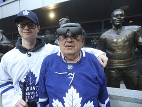 Eric MacDonald, 78, a father of four from Halifax was in town to watch his beloved Toronto Maple Leafs play the Boston Bruins with his grandson Mathew Smith. MacDonald has COPD and suffers from diminished vision. A charity "We Are Young" heard about his predicament and partnered with eSight to grant his wish to attend a Leafs game with an eSight 4 device - a high-def, high-speed camera, two OLED screens allowing him to actually see it. in Toronto on Friday April 29, 2022.