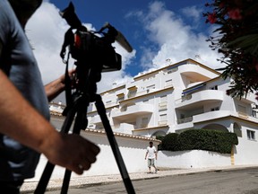 A cameraman films the apartment where three-year-old Madeleine McCann disappeared in 2007, in Praia da Luz, Portugal, June 4, 2020.