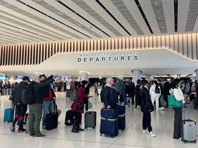 Eu To Abandon Emergency Phase Of Covid Pandemic, Document Says Passengers Queue For Security Checks At The Departures Area Of Terminal 2 At Manchester Airport In Manchester, Uk April 4, 2022.