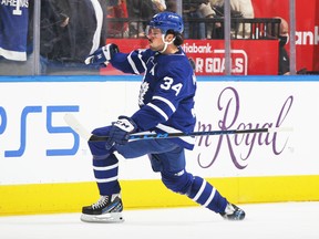 Maple Leafs sniper Auston Matthews celebrates scoring his 60th goal of the season, on Tuesday against the Detroit Red Wings.