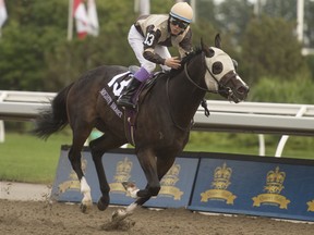 Mighty Heart winning the Queen's Plate in September 2020 at Woodbine.