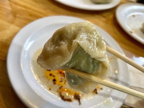 A momo, a Tibetan dumpling, served up at Phayul Restaurant in the Jackson Heights neighbourhood of Queens, N.Y.