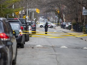 Toronto Police at the scene of a homicide at Ontario St. and Shuter St. in Toronto April 3, 2022.