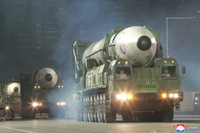 Hwasong-17 Icbms Take Part In A Nighttime Military Parade Marking The 90Th Anniversary Of The Founding Of The Korean People'S Revolutionary Army In Pyongyang, North Korea, In This Undated Photo Released By North Korea'S Central News Agency (Kcna) In April.  26, 2022.